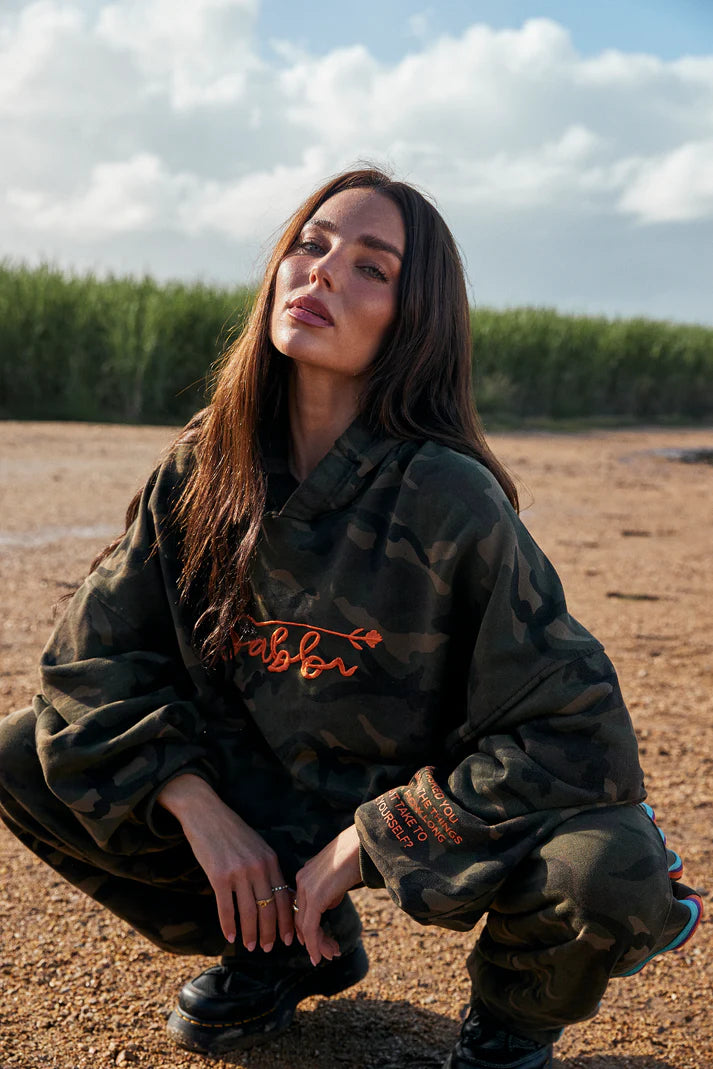 YOU HAVE ALWAYS BEEN ENOUGH!
Crafted from soft 100% cotton, this jumper has been enzymed-washed to look like an old friend with charm. With an oversized fit that brings comfort levels to the max, this jumper is a must have. Front embroidery, kangaroo pocket, woven tape on hood and a beautiful quote on the sleeve and back.
