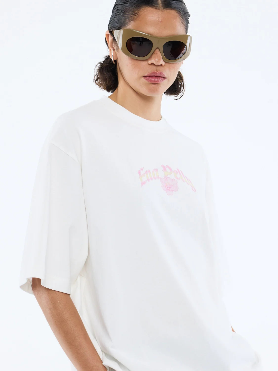 Off-duty ease meets subtle style.
The Ena Pelly Garden Tee is your go-to for relaxed, everyday vibes. Cut in a boxy, oversized silhouette, this tee brings effortless comfort without compromising on style. Crafted from soft cotton jersey, it feels as good as it looks, while delicate floral artwork adds a gentle, feminine touch to a lived-in favourite. The classic crew neckline keeps it simple and versatile, making it perfect for pairing with jeans, skirts, or layered under jackets.