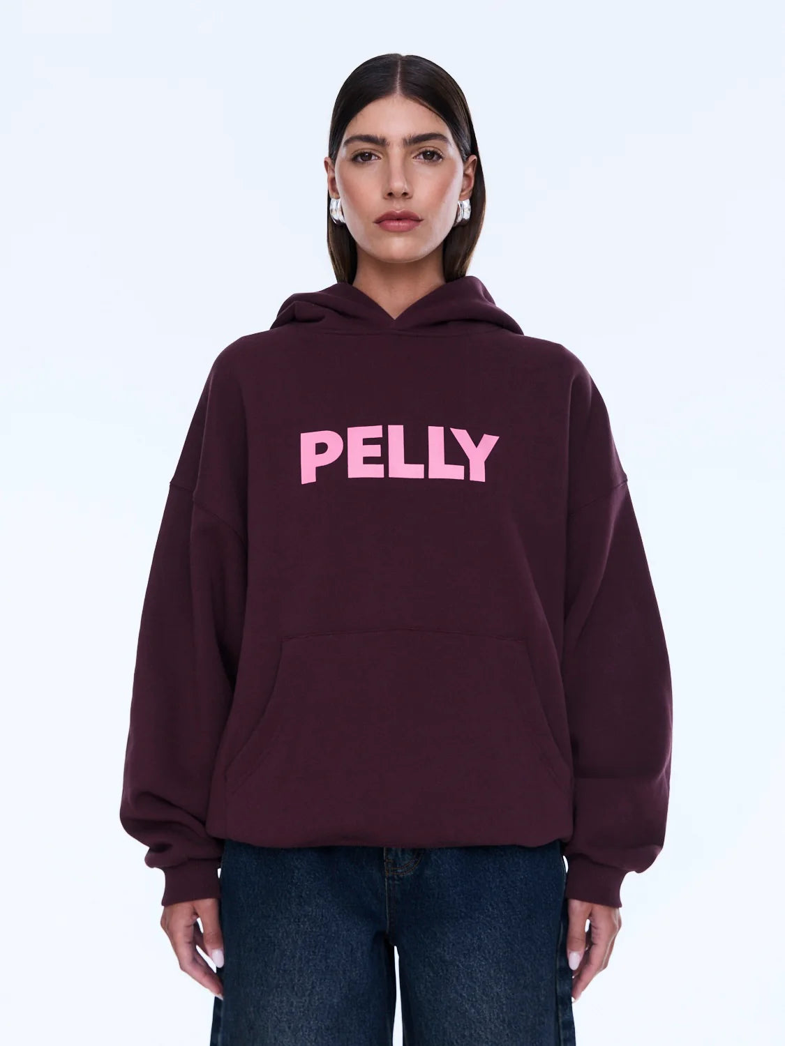 Street Energy. Everyday Ease.
The Cassie Oversized Hoodie is cut from soft brushed cotton blend fleece in deep cherry red with an oversized silhouette and relaxed dropped shoulders. Finished with bold pop pink Pelly graphics across the chest for a playful statement grounded in everyday comfort.
Cotton rich brushed fleece hoodie
Oversized fit with drop shoulder
Self lined hood
In house graphic design
Rib cuffs and hem band
Model is 176cm and wears size 8