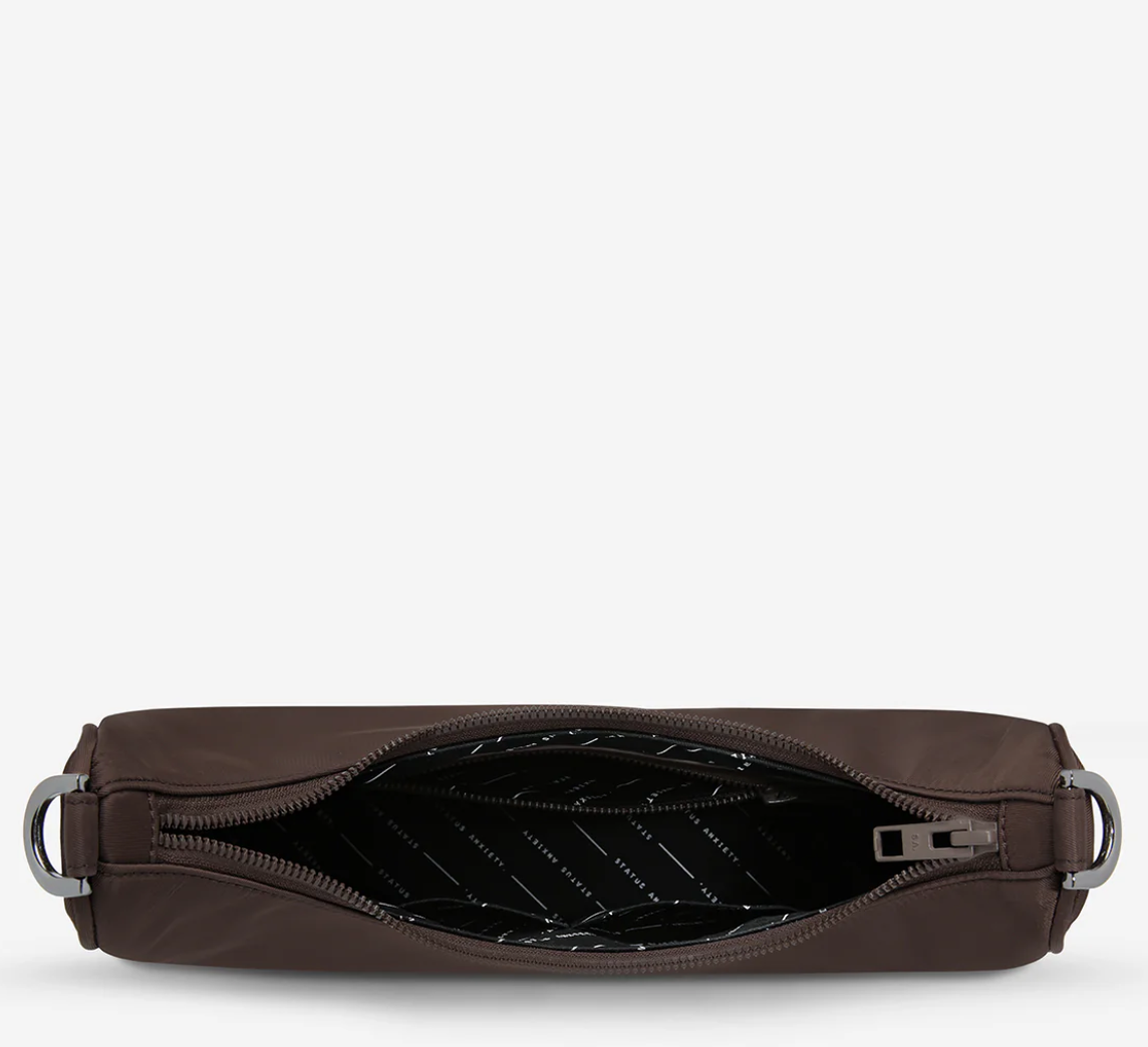 Fleur Recycled Bag - Truffle - Status Anxiety
Versatile and deceptively roomy. 'Fleur' is made of premium reinforced recycled polyester to give it superior structure, and is finished with our branded zippers and tonal hardware. Comes equipped with dual interchangeable straps: a longer webbed strap for everyday crossbody use, and shorter shoulder strap for a dressier look.