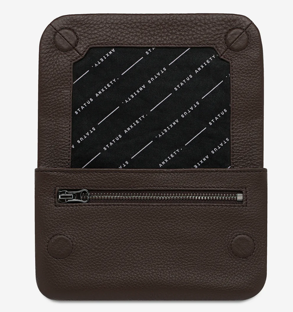Impermanent Wallet - Cocoa - Status Anxiety
Nothing lasts forever they say, but we can assure you that the Impermanent wallet is likely to last a bloody long time. Stash your stuff in its relaxed less structured form and slip it into your pocket or handbag.
Soft shrunken pebble leather
Custom Status Anxiety lining
6 card slots (option to double up)
Internal zipper pocket
Magnet close
Gunmetal hardware
Silver foil logo
Comes in a Status Anxiety branded drawstring bag