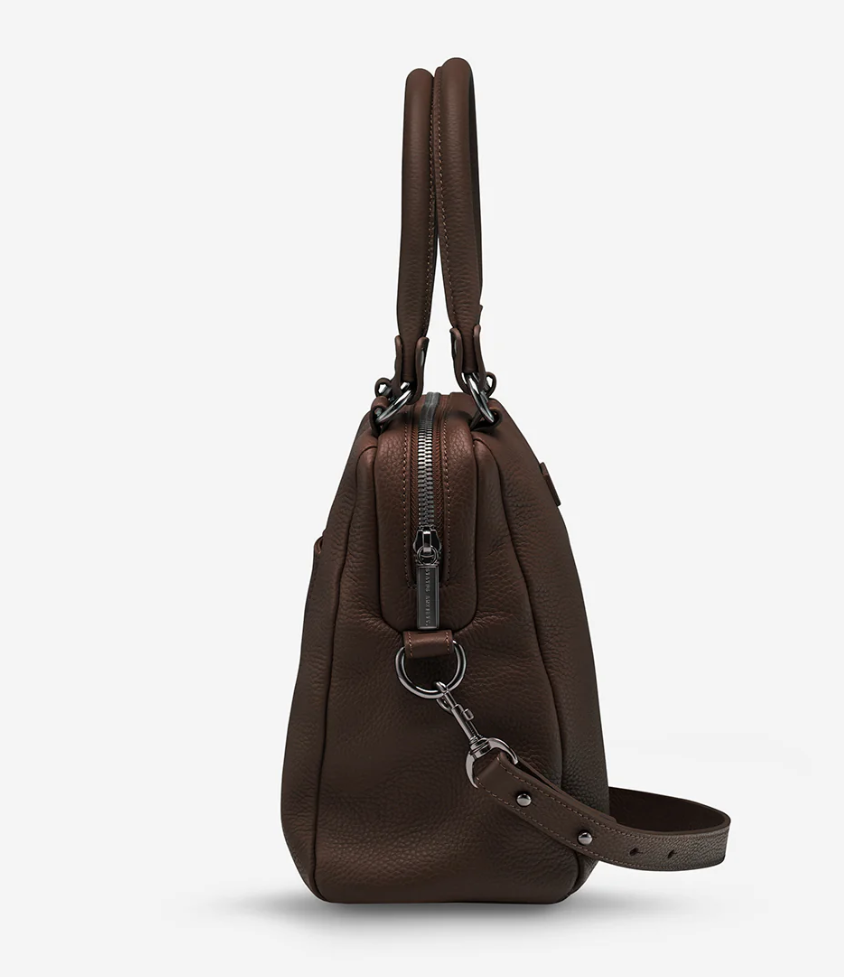 Last Mountains Bag - Cocoa - Status Anxiety
The final assault to end it, to prevail over the proclivity to someone or something. The Last Mountains handbag with its taller silhouette is the perfect day to night companion and can be worn over elbow, shoulder or body (with long strap). Features a wide-opening main compartment, longer shoulder straps for added comfort and secret magnet-close pocket on the outside for your phone etc.
Soft shrunken pebble leather
Back magnet pocket
Internal zipper pocket