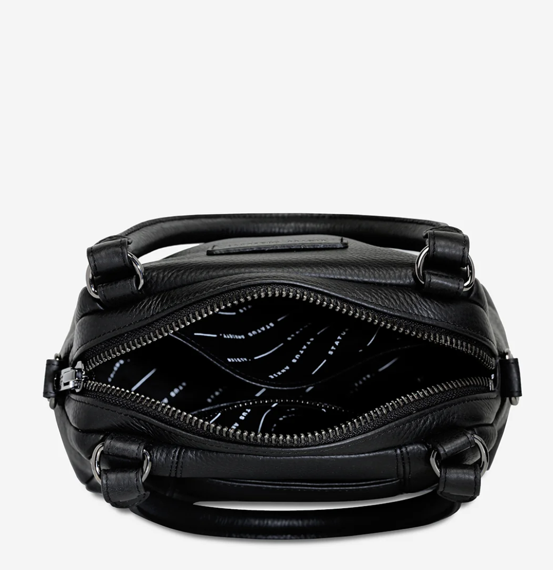 Mini Mountains Bag - Black - Status Anxiety
Good things come in small packages. 'Mini Mountains' is a more compact version of the iconic 'Last Mountains' bag. This day to night companion can be worn on elbow, shoulder, or cross body (with included long strap). Features a wide-opening main compartment, longer shoulder strap for added comfort, and secret magnet-close pocket on the outside for your phone etc.
Soft shrunken pebble leather
Back magnet pocket
Internal zipper pocket, and open pockets