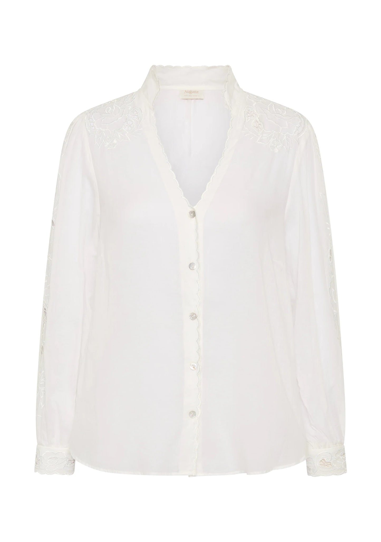 Effortless charm, crafted to perfection.
Meet the Talia Blouse in warm white from Auguste The Label, your new go-to piece for days when you want to feel polished but effortlessly chic. Made from soft, lightweight cotton with a semi-sheer finish, it drapes beautifully and moves with you.
The refined mandarin collar meets a flattering V-neckline, while the button-front closure keeps it classic. But the real showstopper? The long blouson sleeves are adorned with hand-embroidered detailing that trails d