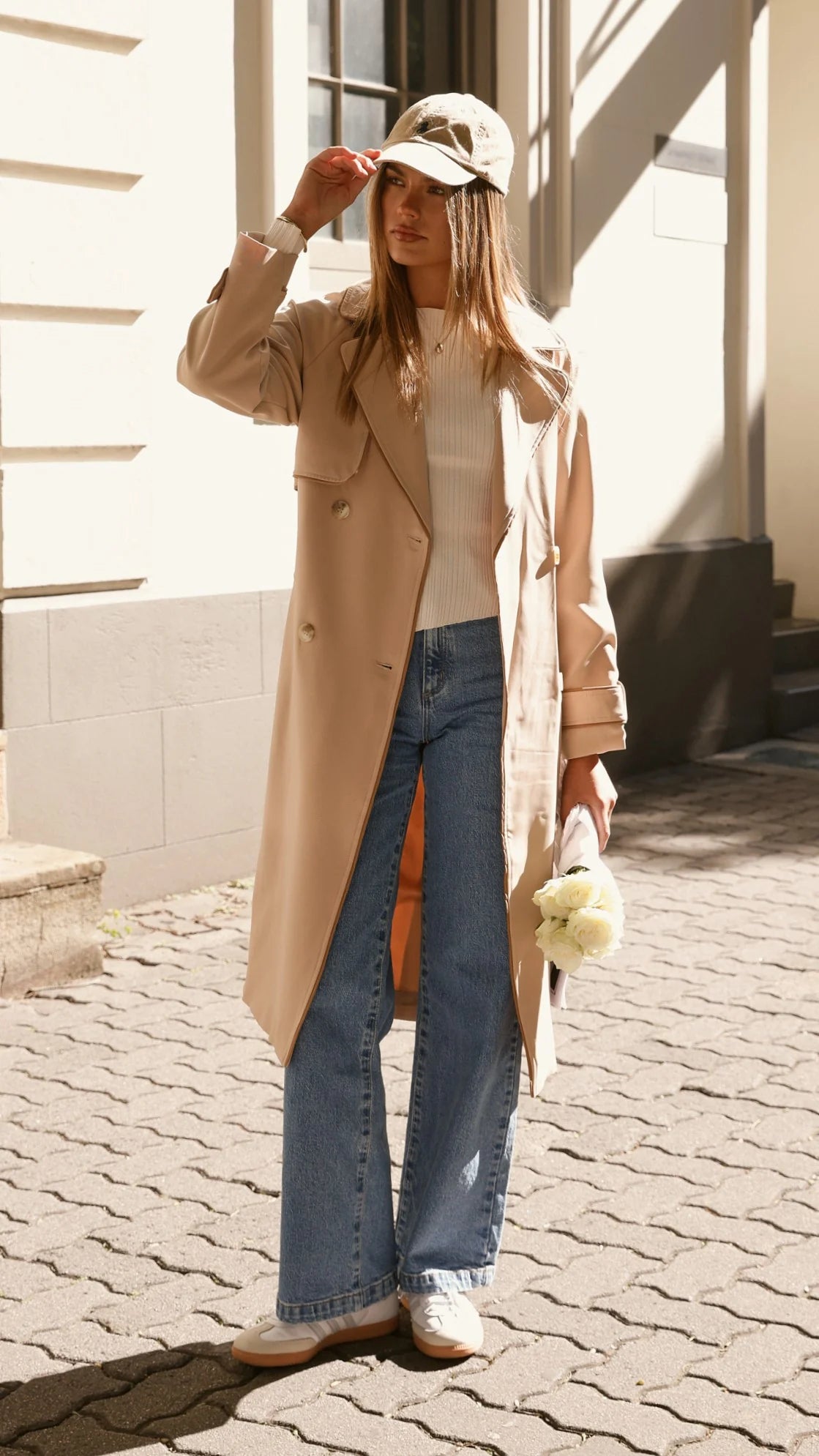The Abrand 94 High & Wide Jeans feature a slim, fitted topblock that flatters the seat, paired with a wider leg for effortless movement. Signature details include the iconic Abrand dice logo on the back pocket in tan, bright wheat stitching, and rose gold trims that add a touch of sophistication. The zip closure ensures a secure fit.
