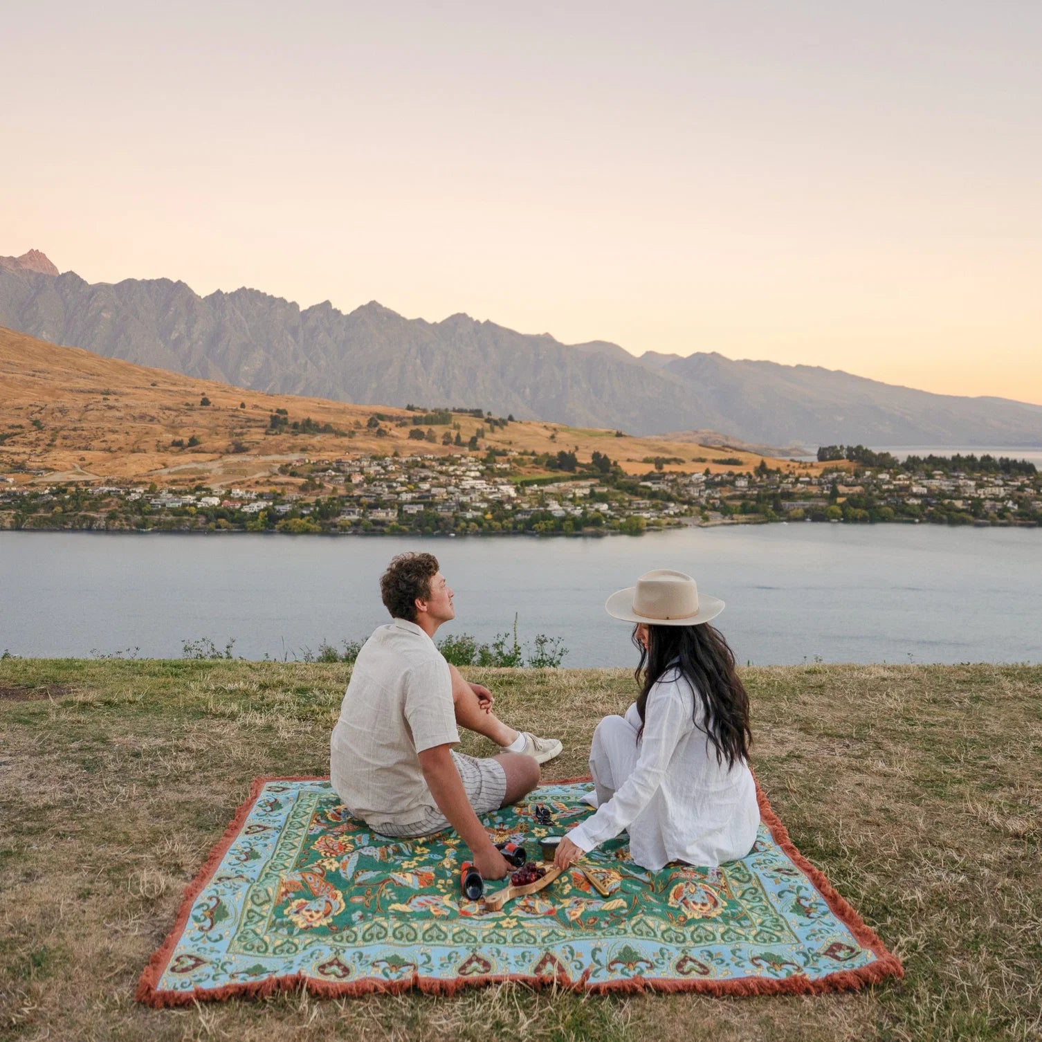 Jade Picnic Rug - Isla 

Introducing the Jade picnic rug - your bohemian escape beneath open skies. Unroll it on the grass, pour a glass, and let its stunning floral details set the scene for an unforgettable day. Perfect for sunset picnics by the lake, self-care moments in the park, or draped at home as a cozy throw.

- Made with 100% cotton

- One-colour tassel trim around the rug

- Extra large picnic rug - approx 200 x 160cm which comfortably fits 4 people 