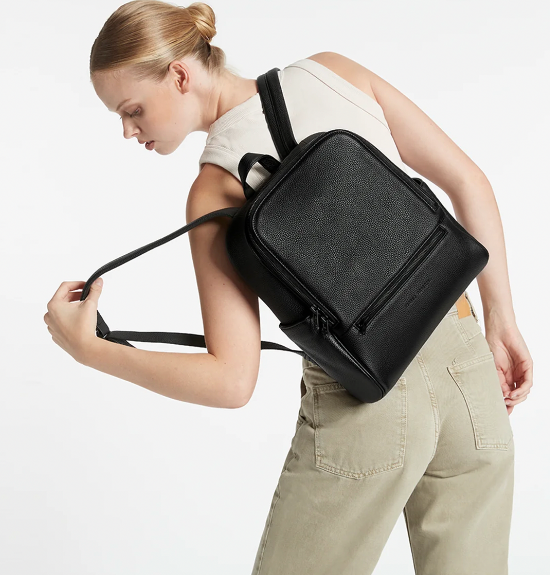 If you call - Black - Status Anxiety 
The archetypal backpack is made to improve your everyday carry. Constructed with comfort and looks in mind and crammed with functionality. The 'If You Call' backpack is perfect for your next last-minute tryst.

Soft shrunken pebble leather
Front zipper pocket, and open side pockets
Internal zipper pocket, and open pouch pockets
Zipper close
Padded shoulder strap
Matte black hardware
Fits a 13 inch MacBook
Custom Status Anxiety lining