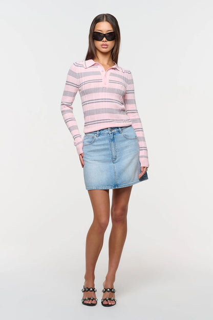 Features a flattering A-line silhouette that flares gently to create an effortless shape
Designed to sit high on the waist with a beautifully structured top block
Finished with classic five-pocket detailing, soft tobacco stitching, and a clean neatened hem