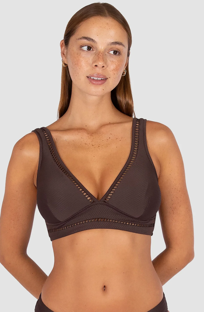 Baku Swimwear 

Crafted in Rococco — Baku's exclusive Spanish textural fabrication that's buttery soft yet beautifully structured — this longline bra top is one of the collection's most elegant styles, with ladder lace detailing at the neck and under the bust.

Best suited for D to DD cup sizes
V neckline with ladder lace detailing at the neck and under the bust for a refined, feminine finish
Side boning for a lifted, sculpted silhouette
Soft removable cups for contouring and shaping