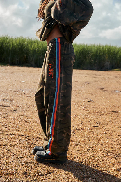 YOU HAVE ALWAYS BEEN ENOUGH!


Stand out in our 100% cotton camo trackpants.
A relaxed fit barrel leg pant with a drawstring waist, two side pockets and woven taped down both leg. These pants gonna get you through the colder months in style.
