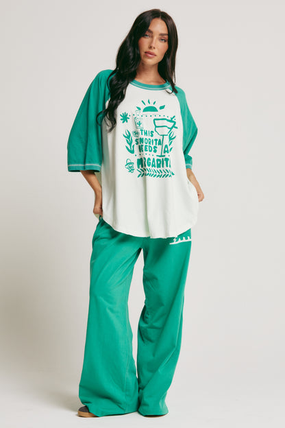 Salt in the air. No plans. Just vibes. 

Meet the Sabbi Raglan Margie Tee, your go-to for slow mornings, sunset hangs, and those “just one more” kind of nights. With a relaxed, oversized raglan fit, this tee drapes effortlessly, feeling as easy on the body as it looks on you.

Made from soft, breathable cotton, it’s lightweight enough to keep you cool but cozy enough to lounge in all day. The contrast raglan sleeves and curved hem give it that perfectly undone, throw-on-and-go energy, while the playful