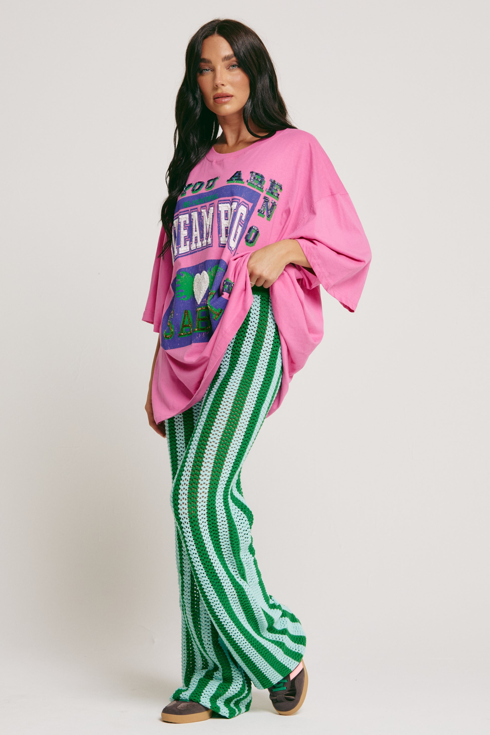 Big fit. Bigger dreams. All vibes.

The Very Oversized Dream Big Beaded Tee from Sabbi is your go-to for effortless, bold style. Made for dreamers, doers, and anyone who loves to make a statement without saying a word, this tee brings major energy in a seriously comfy, relaxed silhouette.

Sporting a varsity-inspired “Dream Big” front print with eye-catching beaded detailing, plus a fearless “Be Fearless 71” statement on the back, it’s all about vintage sports vibes with that signature Sabbi twist. Whether 