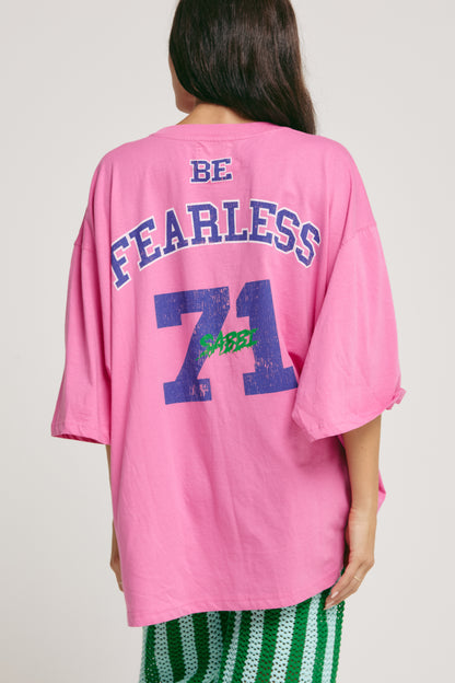 Big fit. Bigger dreams. All vibes.

The Very Oversized Dream Big Beaded Tee from Sabbi is your go-to for effortless, bold style. Made for dreamers, doers, and anyone who loves to make a statement without saying a word, this tee brings major energy in a seriously comfy, relaxed silhouette.

Sporting a varsity-inspired “Dream Big” front print with eye-catching beaded detailing, plus a fearless “Be Fearless 71” statement on the back, it’s all about vintage sports vibes with that signature Sabbi twist. Whether 