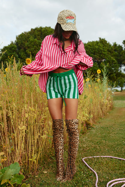 Warning: these might steal the spotlight from the rest of your outfit.

Meet the Sabbi Knit Stripe Bike Pants – Green Stripe, your new go-to for turning everyday looks into something a little more fun. With their fresh green and mint crochet stripes, these bike pants serve up a nostalgic, handmade feel while still looking totally current. It’s that perfect mix of laid-back summer energy and bold, playful style.