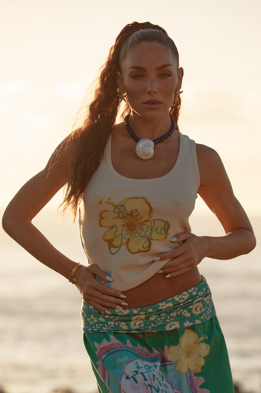 Sabbi - A little reminder you can wear. The Be-Youtiful Tank is all about easy confidence, sun-kissed tones and that feel-good, beachside energy. Crafted in a soft, breathable fabric with a flattering, fitted silhouette, this tank hugs just right while still feeling effortless.