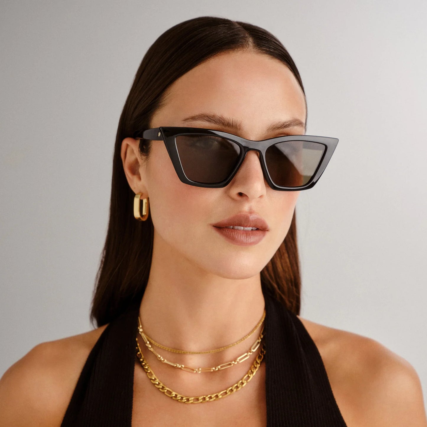 Featuring sweeping lines and refined proportions, our VELODROME sunglasses are an invariable classic. Designed with a midsized fit and chic signature pinstripe metal hardware on both temples, this refined cat-eye style is suitable for all face shapes and will look sharp with any outfit.

• Finished in classic black with dark lenses for an everyday look.
• Made using BPA free polymer plastic which is lightweight, durable and impact resistant.
• Fitted with shatterproof and scratch resistant polycarbonate len