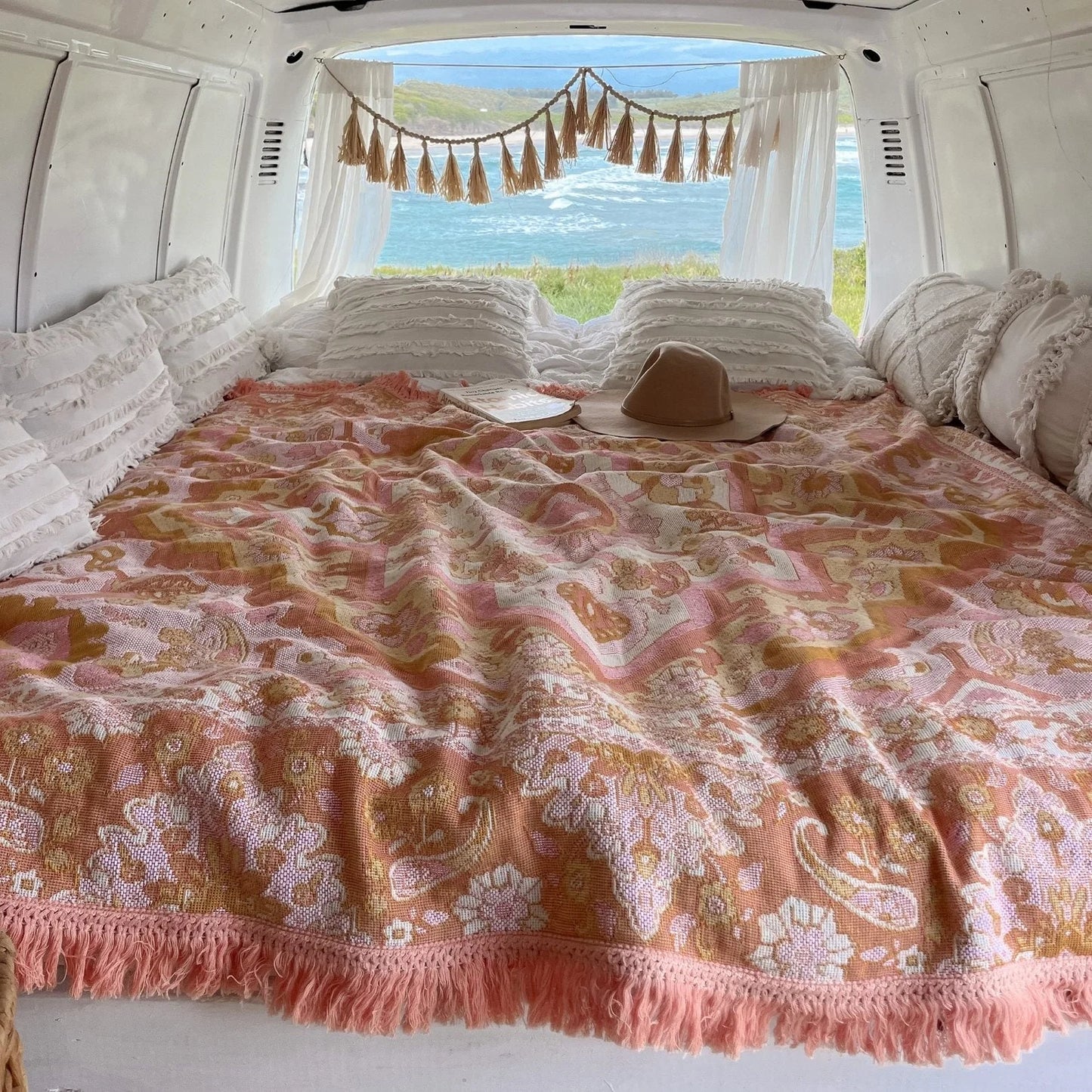 Sundown Picnic Rug - Isla
Created with only the dreamiest sunset hues, Sundown is reminiscent of all of your favourite holiday moments. Endless beach days, the smell of coconut sunscreen, balmy afternoons, ocean swims and sunset picnics with the girls sipping on your favourite fruit cocktail. Created to give you good summer vibes with hues of coral, pinks, yellow, orange and cream.

- Made with 100% cotton 

- One colour tassel trim around the rug

- Extra large picnic rug - approx 190 x 160cm 