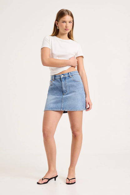 90's Relaxed Mini Skirt by ROLLAS

90’s Relaxed Mini Skirt is a mid-rise mini skirt with a relaxed, easy fit
Designed to sit comfortably on the waist, and finishes at mid-thigh
Will soften and mould to the body over time
Combines nostalgic 90’s styling with everyday wearability
Made with Rolla's signature vintage trims
Button fly closure