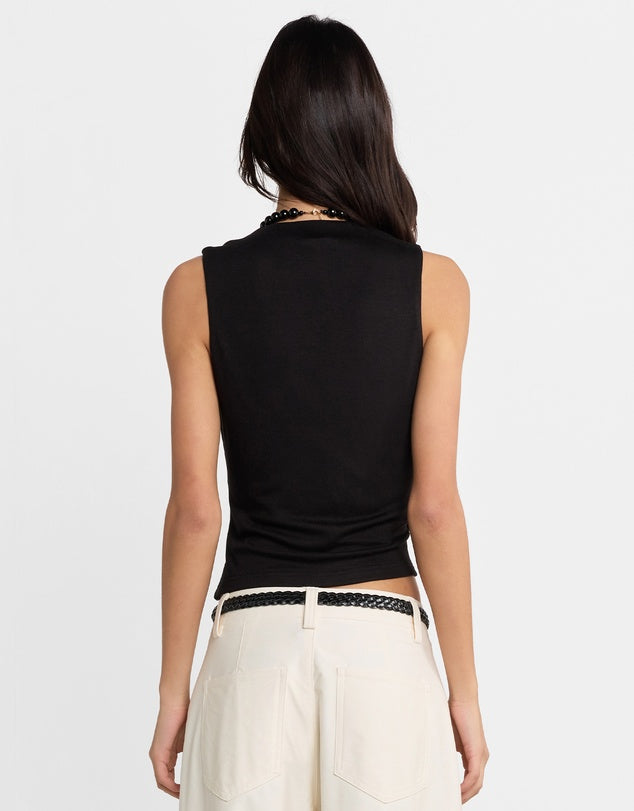 Elevate your wardrobe with the Jenkins Top from Madison The Label. A chic V-neck jersey top featuring a draped wrap front and an asymmetric hem. This top offers a flattering and stylish fit that's both comfortable and stylish. Perfect for pairing with everything from tailored trousers to your favorite jeans, it’s versatile enough for both work and weekend looks.

Hope is wearing a size small. She is 180cm (5'11) tall, has an 76cm bust, 58cm waist and 89cm hips.