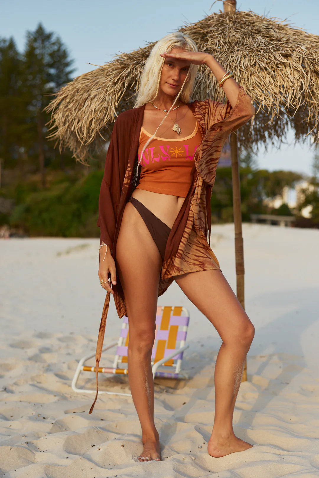 Sun-Kissed Vibes, All Day Comfort

Meet the Only Love Singlet ~ Papaya by Only Lovers Left, your go-to for effortless summer style. Crafted from a soft, ribbed cotton–spandex blend, it’s stretchy yet structured, hugging your curves in all the right places while keeping you cool and comfy. The flattering low neckline and open back bring breezy, easygoing charm, while the contrast trim adds a subtle pop of style. 
