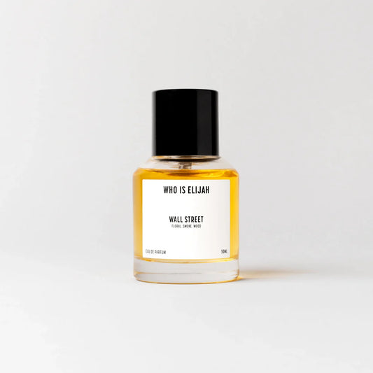WALL STREET&nbsp;is for the one who understands the art of subtle seduction. It’s a fragrance that doesn’t scream for attention, it simply demands it. Sophisticated, yet daring, it lingers in the air, leaving a trail of undeniable allure.

The opening is an unexpected dance of rose and raspberry, sweet yet sharp, like a secret whispered in the ear. It’s an invitation, a promise of something more, full of intrigue and desire.

As&nbsp;WALL STREET&nbsp;evolves, the richness of oud, saffron, and smoky wood dee