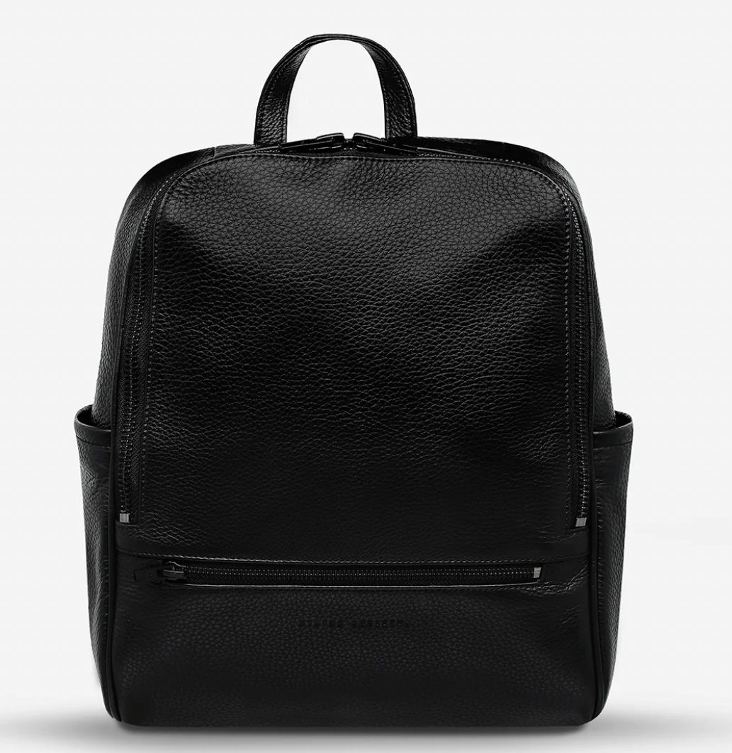 If you call - Black - Status Anxiety 
The archetypal backpack is made to improve your everyday carry. Constructed with comfort and looks in mind and crammed with functionality. The 'If You Call' backpack is perfect for your next last-minute tryst.

Soft shrunken pebble leather
Front zipper pocket, and open side pockets
Internal zipper pocket, and open pouch pockets
Zipper close
Padded shoulder strap
Matte black hardware
Fits a 13 inch MacBook
Custom Status Anxiety lining