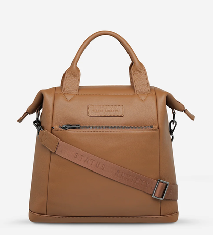 Mini waves Camel - Status Anxiety 

Made in response to the (very) popular request to make a smaller size version of our best selling 'Comes In Waves' bag. Mini Waves is the perfect uni or work bag with a wide opening top, space for your laptop and multiple compartments to keep everything in its place. Carry in hand with the top straps, over the body with the long webbed strap (included), or on your back with the shoulder straps. Big enough to carry everything you need, not too big to slow you down.
