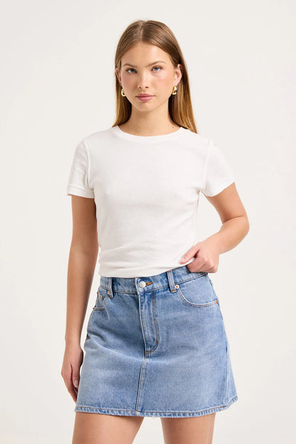 90's Relaxed Mini Skirt by ROLLAS

90’s Relaxed Mini Skirt is a mid-rise mini skirt with a relaxed, easy fit
Designed to sit comfortably on the waist, and finishes at mid-thigh
Will soften and mould to the body over time
Combines nostalgic 90’s styling with everyday wearability
Made with Rolla's signature vintage trims
Button fly closure
