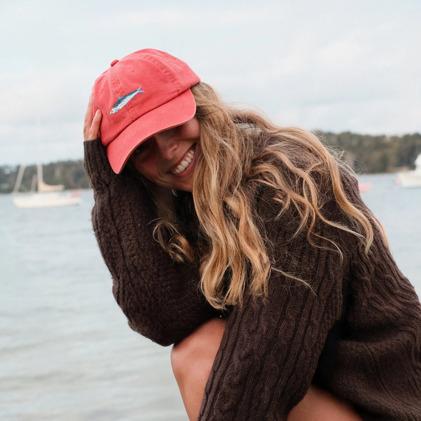 The Sardine Lid by Pallion PT  (Sardinops sagax) is a premium cotton dad cap in a punchy, tomato sauce red. Soft but structured. Relaxed but refined. Embroidered with a hand-drawn sardine, because small fish can still make a splash.