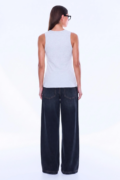 Soft Texture. Confident Mood. The Celine Tank is crafted in cotton with a fitted silhouette, using soft rib fabrication to create a streamlined oat marle base. Finished with a classic crew neckline and exclusive in-house stack print branding, tonal Ena Pelly detailing keeps the look understated and refined for an effortless everyday layer.