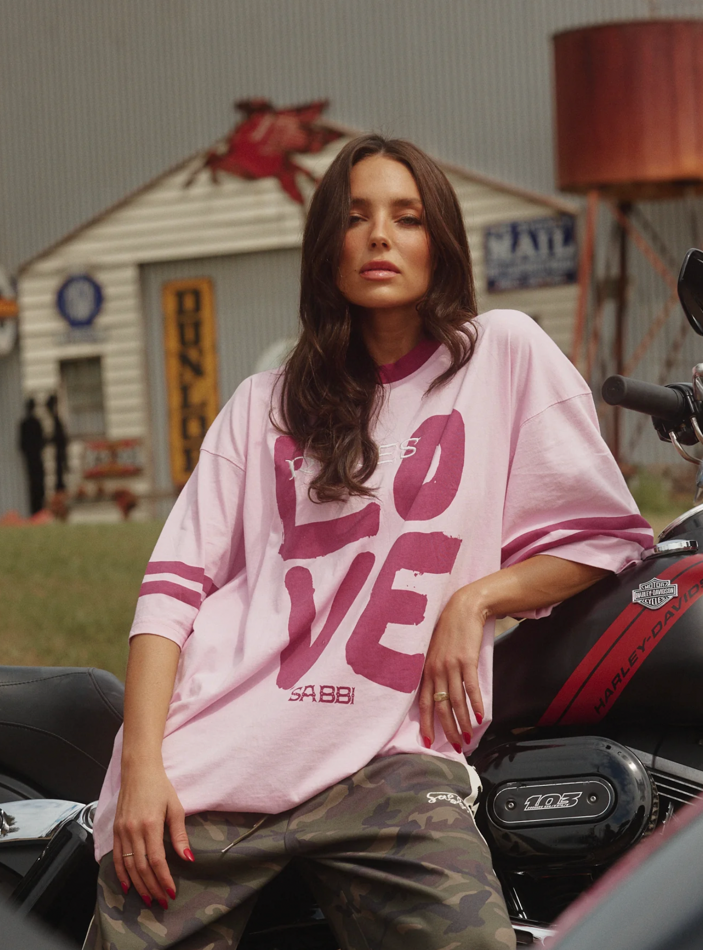 THE VERY OVERSIZED LOVE REVOLUTION TEE - PINK SABBI

IT'S A SABBI LOVE REVOLUTION!

The Very Oversized Love Revolution Tee is for rule-breakers, fun lovers and peeps who like their tees oversized and wear their hearts on their sleeves.

Designed in a very oversized, relaxed silhouette, this tee features a bold, hand-painted LOVE graphic front and REVOLUTION print on the back. With a contrast neckline and cool double stripes around the sleeve this tee is perfect for throwing on post-swim.