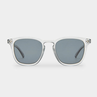 NO BIGGIE is a modern take on a fifties rectangular shape, offering the sharpest look of the season. Featuring classic rivet detailing, it combines bold style with timeless appeal.

• Finished in a crystal grey frame with dark lenses.
• Made using BPA free polymer plastic which is lightweight, durable and impact resistant.
• Fitted with shatterproof and scratch resistant polycarbonate lenses