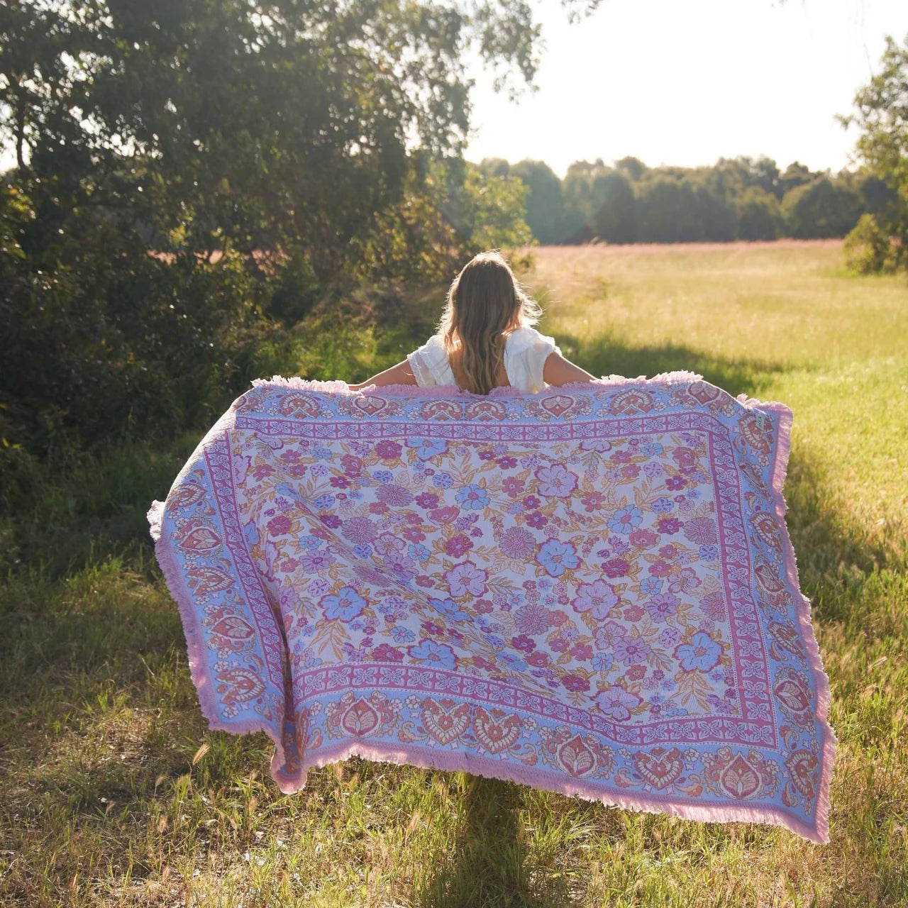 Daisy Picnic Rug - Isla 

Daisy captures the softness of a sun-lit garden, woven in a feminine palette of blush, blue and orange tones. Its boho floral print brings a nostalgic, free-spirited beauty to picnics and slow afternoons outdoors. A piece made to elevate simple moments into memories.

- Made with 100% cotton

- One-colour tassel trim around the rug

- Extra large picnic rug - approx 200 x 160cm which comfortably fits 4 people
