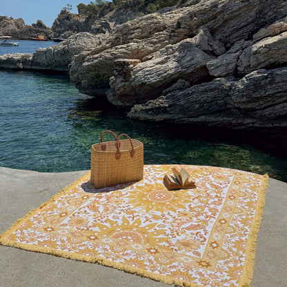 Vacanza Picnic Rug - Isla 

Introducing the Vacanza picnic rug - your passport to an effortless Euro summer escape. Inspired by the vibrant energy of sun-kissed afternoons, this rug features a playful blend of bright summer hues, and a bold bohemian sunshine pattern. Designed to elevate every gathering, it’s the perfect companion for outdoor adventures, from beachside picnics to alfresco dining.

- Made with 100% cotton

- One-colour tassel trim around the rug

- Extra large picnic rug - approx 200 x 160cm 
