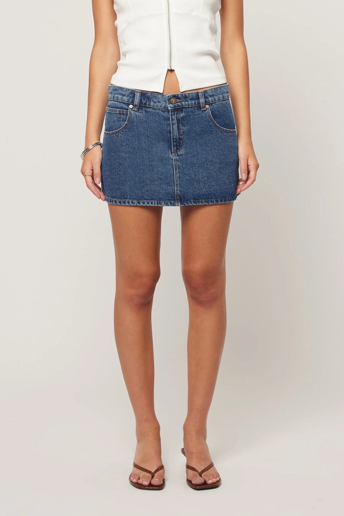 Low-rise denim energy made for your off-duty days.

This one’s got “cool without trying” written all over it.&nbsp;Meet the A Brand Jeans 99 Low Skirt in Bella, a ‘90s-inspired mini that brings effortless street style straight into your wardrobe. Sitting low on the hips with a 29cm length, it’s designed to give you that laid-back, nostalgic fit that feels equal parts relaxed and flattering.