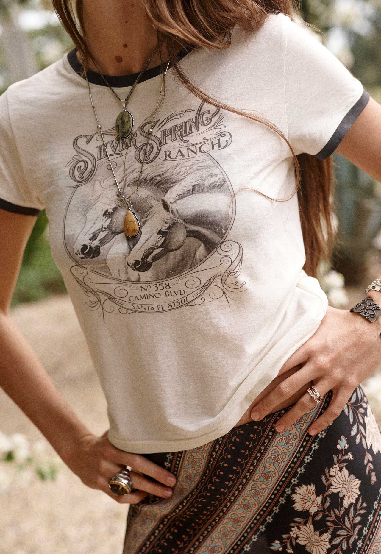 Silver Spring Tee Spell


The Silver Spring Tee in Vintage Cream channels effortless vintage attitude with an iconic Spell edge. Inspired by classic biker tees, this timeless silhouette brings a rebellious spirit to everyday dressing with a softly lived-in feel.

Crafted from 100% organic cotton in a slub cotton fabrication, it offers a breathable, textured feel with an authentic vintage character. The shrunken tee fit creates a flattering, more fitted silhouette, while short sleeves finished with rib cuffs