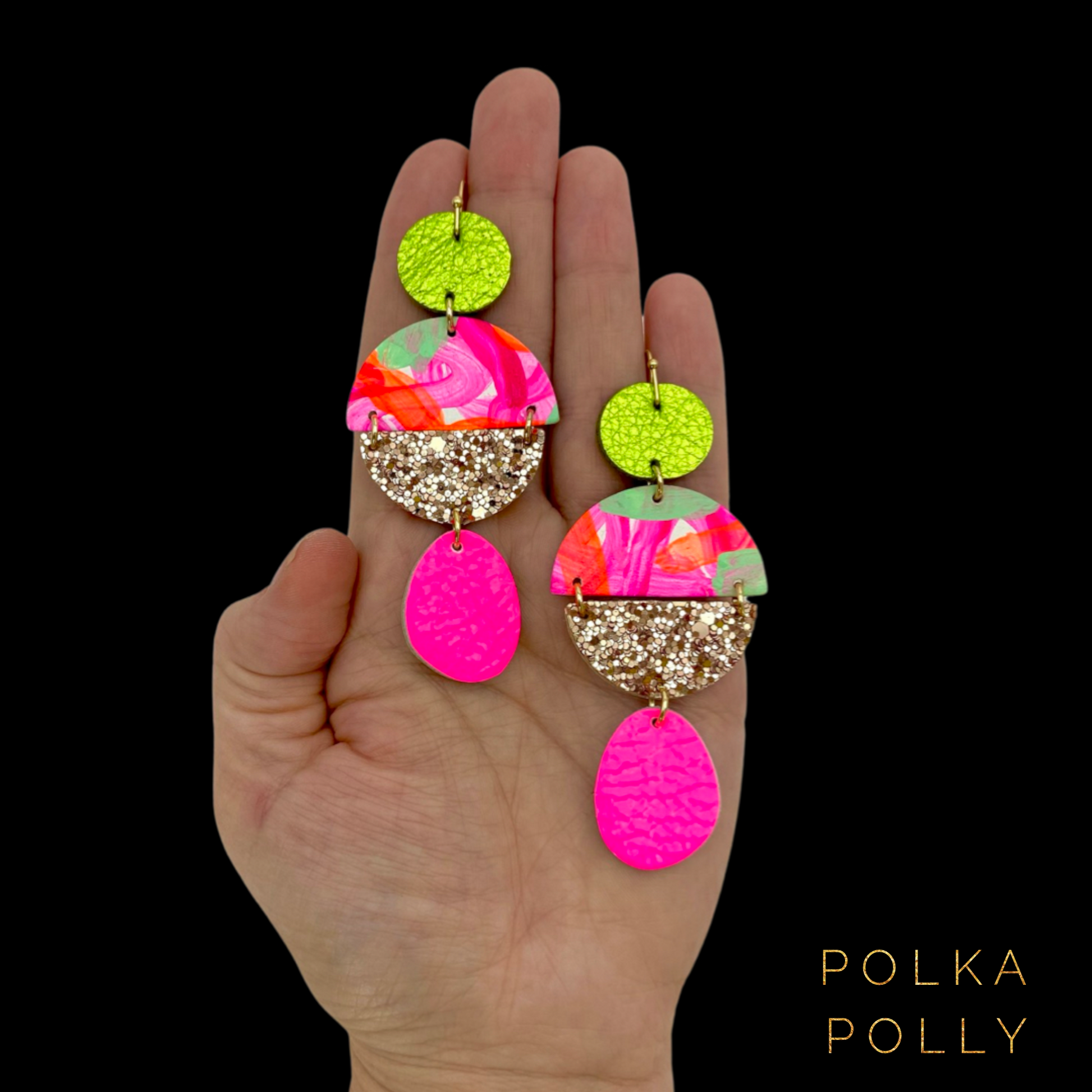 Hand painted beads in pinks, orange and mint. Paired with metallic citrus green, light gold&nbsp;glitter and neon pink genuine leather beads. Set on golden stainless steel hooks.

Light weight and comfortable to wear.

Each pairs pattern and colour placement will differ.