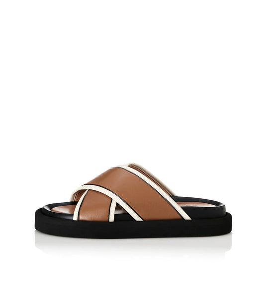 The Anissa from Alias Mae is a new season sandal. With a leather upper and lining construction this sandal features a crossover strap and contrast piping finish.