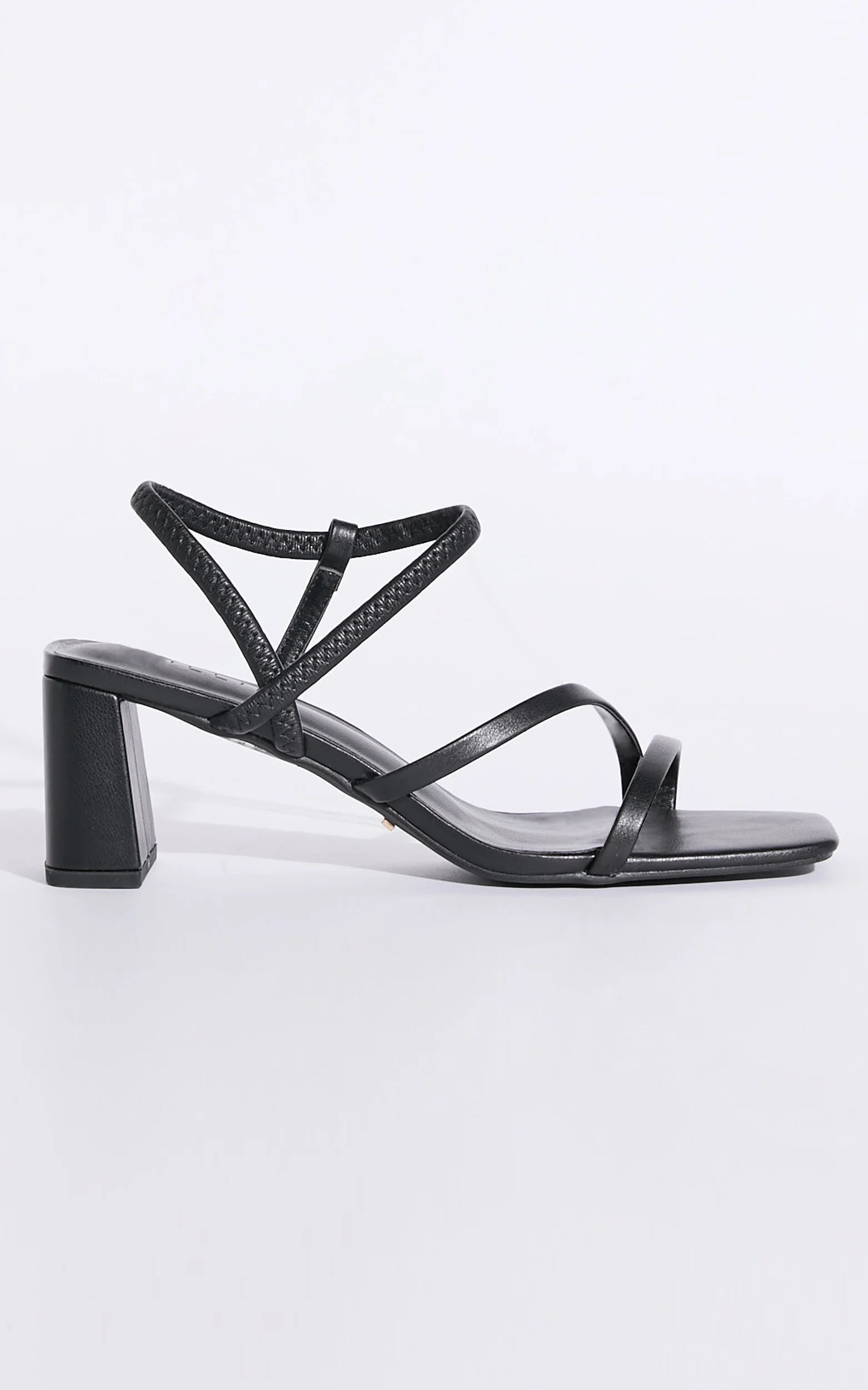 Hennie is your new staple strappy heel, available exclusively to Billini.

Step into effortless elegance with the Hennie heel - a modern classic designed to elevate every look. Delicate straps wrap gracefully around the foot, creating a barely-there silhouette that’s both bold and feminine.