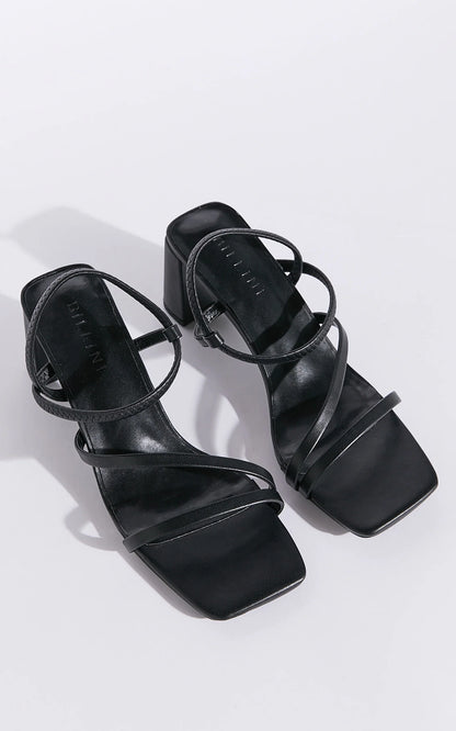 Hennie is your new staple strappy heel, available exclusively to Billini.

Step into effortless elegance with the Hennie heel - a modern classic designed to elevate every look. Delicate straps wrap gracefully around the foot, creating a barely-there silhouette that’s both bold and feminine.