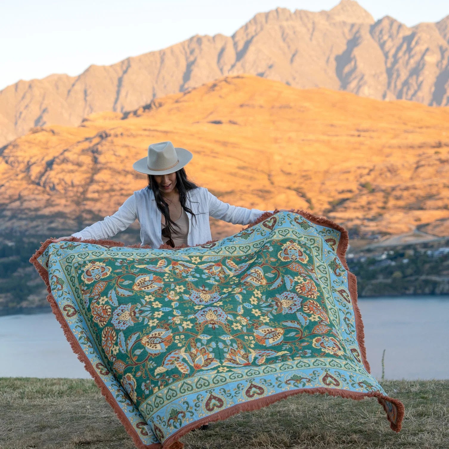 Jade Picnic Rug - Isla 

Introducing the Jade picnic rug - your bohemian escape beneath open skies. Unroll it on the grass, pour a glass, and let its stunning floral details set the scene for an unforgettable day. Perfect for sunset picnics by the lake, self-care moments in the park, or draped at home as a cozy throw.

- Made with 100% cotton

- One-colour tassel trim around the rug

- Extra large picnic rug - approx 200 x 160cm which comfortably fits 4 people 