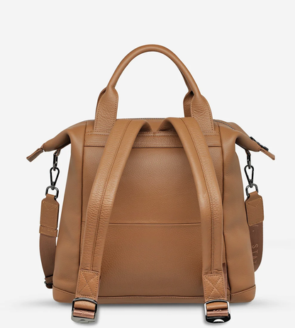 Mini waves Camel - Status Anxiety 

Made in response to the (very) popular request to make a smaller size version of our best selling 'Comes In Waves' bag. Mini Waves is the perfect uni or work bag with a wide opening top, space for your laptop and multiple compartments to keep everything in its place. Carry in hand with the top straps, over the body with the long webbed strap (included), or on your back with the shoulder straps. Big enough to carry everything you need, not too big to slow you down.