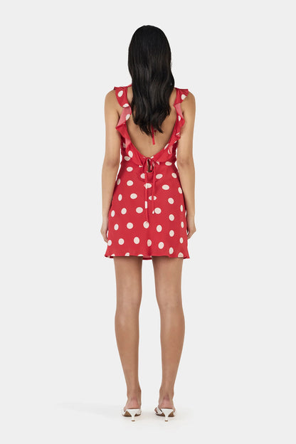 Say hello to your instant “cute without trying” era.

The Ownley Candy Mini Dress – Red Polka is the kind of piece that does all the flirting for you. Cut on the bias for that soft, body-skimming drape, it moves with you in the most effortless way—light, playful, and just a little bit cheeky. The bold red polka dot print brings main-character energy, while the scooped frill neckline adds a sweet, feminine touch that feels flirty without overdoing it.