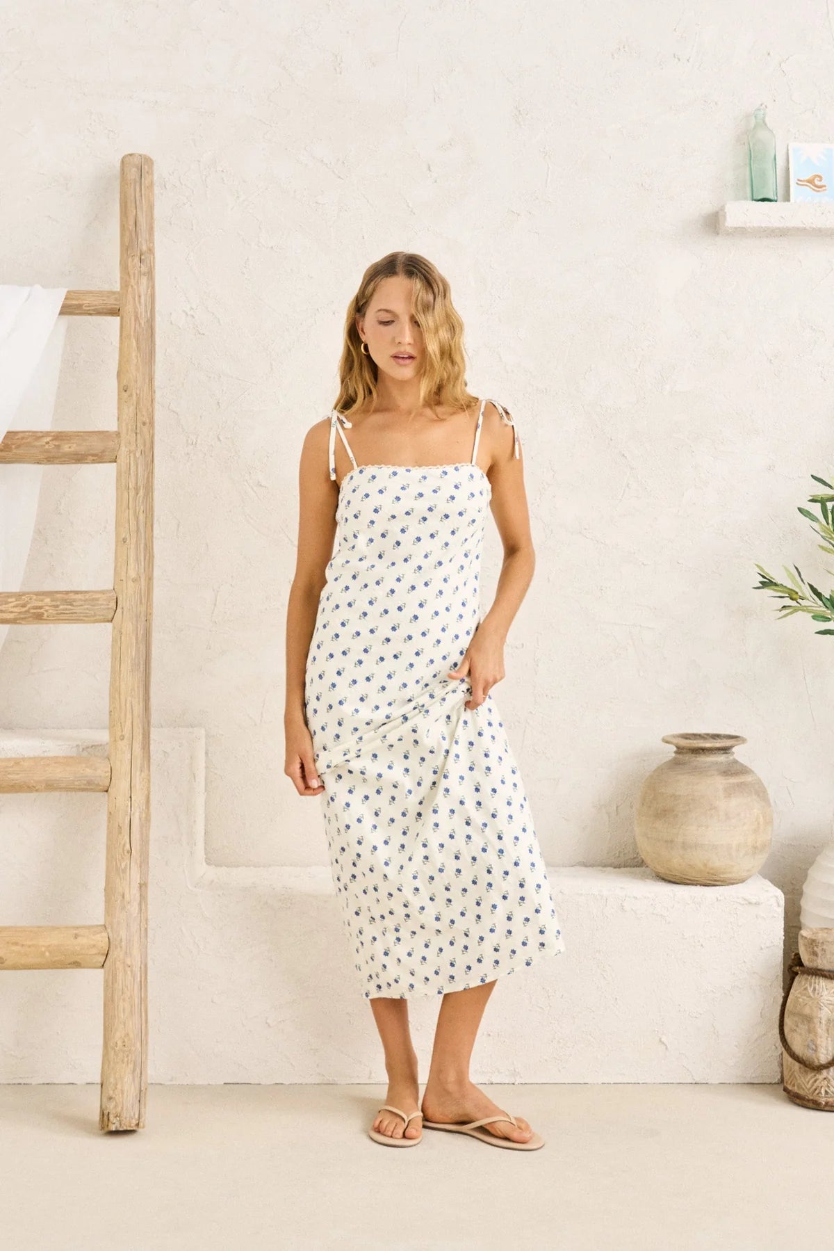 Romantic, floaty, and made for golden-hour plans you didn’t want to end anyway.

The Rhythm Printed Floral Midi Dress brings vintage-inspired charm into an effortlessly wearable silhouette. Designed in a soft floral print, it channels that laid-back, sun-drenched energy Rhythm is known for. Easy, feminine, and just the right amount of nostalgic.