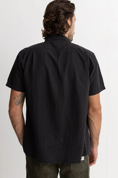 A year round staple spun from a breathable linen cotton blend fabrication, the Classic Linen Short Sleeve Shirt is a soft-touch standard fit featuring a straight hem and a slightly wider fit, making it great for wearing open or buttoned down. This style is a wardrobe staple, made for laid back days.