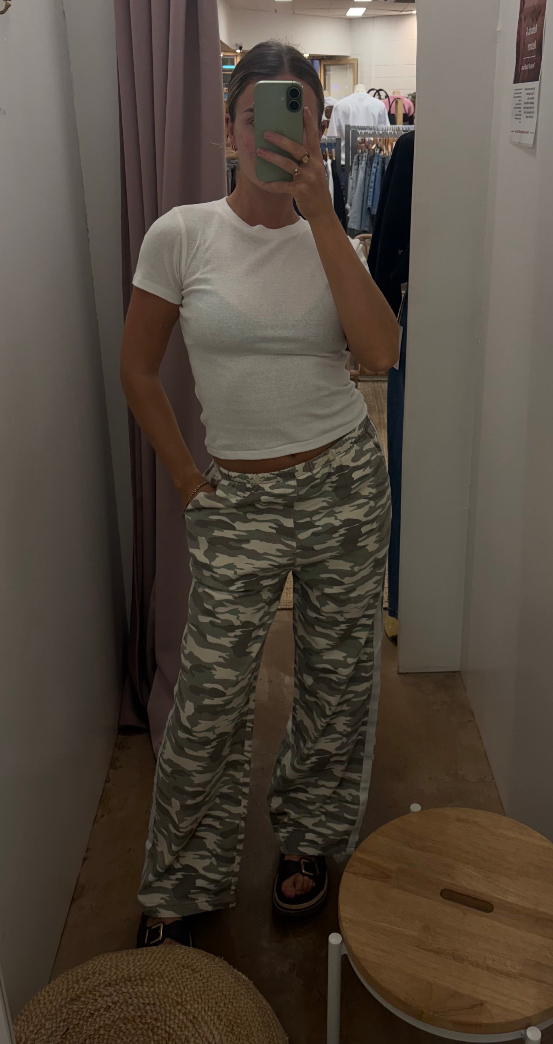 Camo Pants - By Frankie 
Details
Make a statement with the Camo Pants in light camo and white stripe. The high-waisted silhouette features an elasticated waistband and front tie detail for a flattering fit. Practical side pockets and a straight leg cut complete the look.

Product Details: 

High waisted
Elasticated waist band
Front tie detail
Side pockets
Straight leg fit
Race stripe detail on side seams
