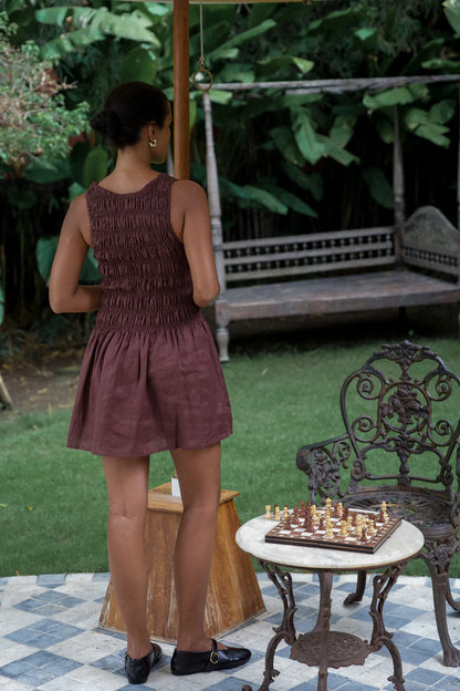 The Elle - A playful yet considered mini dress offering an effortlessly romantic feel that will take you from day to night. Featuring a soft shirred bodice and A-line mini skirt, she will be one to reach for all occasions

Hand dyed on 100% Linen.



- Mini Length

- Shirred bodice

- Round neckline

- A-line

- No lining&nbsp;

Our model Luisa is 176cm and wears a size 10