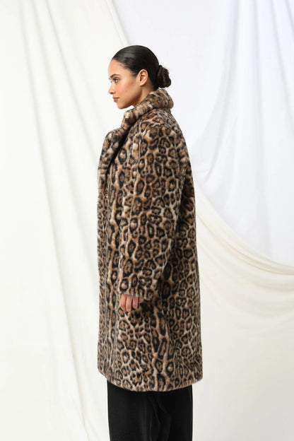 Dee Coat - Kachel

Feel fabulous in the Dee Coat by Kachel - bold, fierce, and ready to elevate any look.

Featuring long sleeves, a classic collared neckline, and sleek snap buttons, this coat brings effortless edge. The striking animal print makes a statement every time - the perfect throw-on to take any outfit up a notch.

Coat
Animal print
Long sleeve
Clasp buttons
Our model is 180 cm (5'11") tall with a 91 cm (35.8") bust, a 74 cm (29") waist, and 102 cm (40.2") hips.

Our model is wearing size 10 AU.
