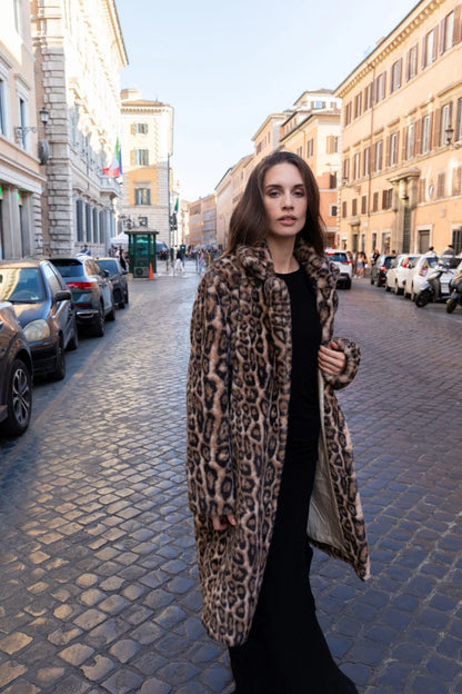 Dee Coat - Kachel

Feel fabulous in the Dee Coat by Kachel - bold, fierce, and ready to elevate any look.

Featuring long sleeves, a classic collared neckline, and sleek snap buttons, this coat brings effortless edge. The striking animal print makes a statement every time - the perfect throw-on to take any outfit up a notch.

Coat
Animal print
Long sleeve
Clasp buttons
Our model is 180 cm (5'11") tall with a 91 cm (35.8") bust, a 74 cm (29") waist, and 102 cm (40.2") hips.

Our model is wearing size 10 AU.
