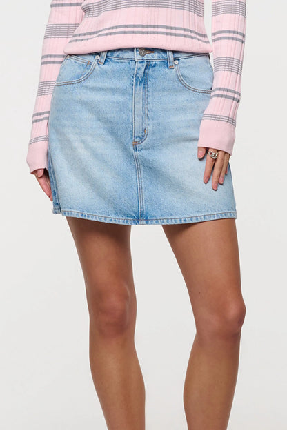Features a flattering A-line silhouette that flares gently to create an effortless shape
Designed to sit high on the waist with a beautifully structured top block
Finished with classic five-pocket detailing, soft tobacco stitching, and a clean neatened hem